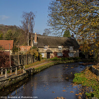 Buy canvas prints of Chocolate Box Cottage by the Stream by Ron Ella