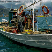 Buy canvas prints of Repairing Nets by the Harbourside by Ron Ella