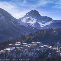 Buy canvas prints of Snowy village and Apuan mountains in winter. by Stefano Orazzini