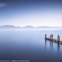 Buy canvas prints of Wooden jetty at sunrise. Lake Massaciuccoli by Stefano Orazzini
