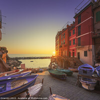 Buy canvas prints of Riomaggiore village boats in the street at sunset. Cinque Terre by Stefano Orazzini