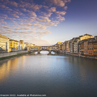 Buy canvas prints of Ponte Vecchio bridge and Arno river in Florence at sunset. by Stefano Orazzini