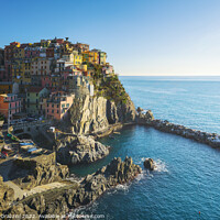 Buy canvas prints of Manarola, village on the rocks, on a clear day. Cinque Terre by Stefano Orazzini