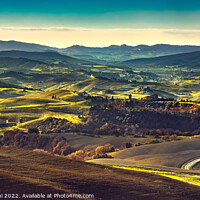 Buy canvas prints of Volterra winter panorama, rolling hills and green fields at sunset by Stefano Orazzini