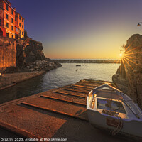 Buy canvas prints of Riomaggiore village, a boat in front of the sea. Cinque Terre by Stefano Orazzini