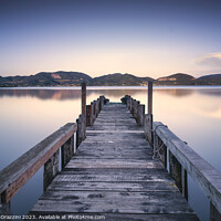 Buy canvas prints of Wooden pier on Lake Massaciuccoli. Tuscany by Stefano Orazzini