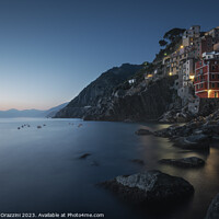 Buy canvas prints of Blue twilight over the fishing village of Riomaggiore. Cinque Te by Stefano Orazzini