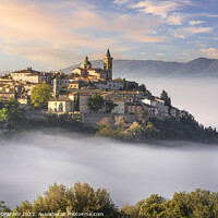 Buy canvas prints of Trevi picturesque village in a foggy morning. Umbria, Italy by Stefano Orazzini