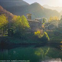 Buy canvas prints of Isola Santa village and lake in autumn. Garfagnana, Italy by Stefano Orazzini