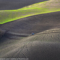 Buy canvas prints of Tractor plowing the fields in Tuscany. Volterra, Italy by Stefano Orazzini