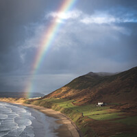 Buy canvas prints of Rainbow at Rhossili  by Marcus Woodbridge