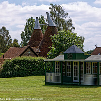 Buy canvas prints of Oast House and Cricket Pavilion by John Gilham