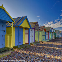 Buy canvas prints of Colourful Beach Huts on Herne Bay beach Kent by John Gilham