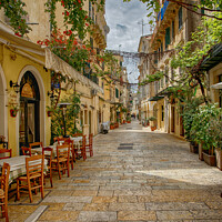 Buy canvas prints of Shaded street in Corfu Town by John Gilham