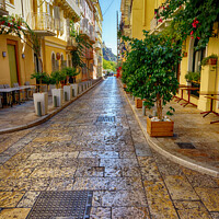 Buy canvas prints of Quiet Street in Corfu Town on THe Greek Island of Corfu by John Gilham
