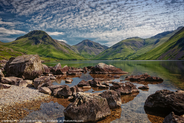 Rocks on the shore of wast Water Cumbria UK Picture Board by John Gilham