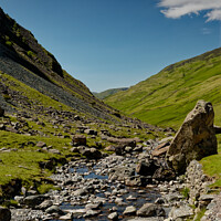 Buy canvas prints of Stony Shallow Stream in The Lake District of Cumbria UK by John Gilham