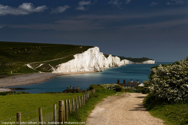 Sun on The Seven Sisters White Cliffs at Cuckmere Haven in East Sussex Framed Mounted Print by John Gilham