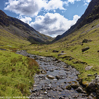 Buy canvas prints of A stony stream at Honister Pass in The English Lak by John Gilham