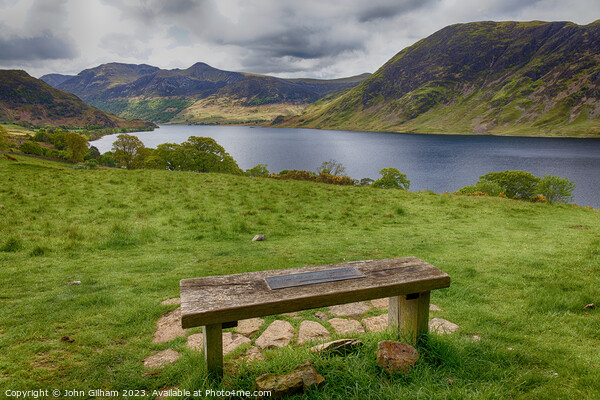 A Bench with a view over Crummock Water in the UK Lake District of Cumbria Picture Board by John Gilham