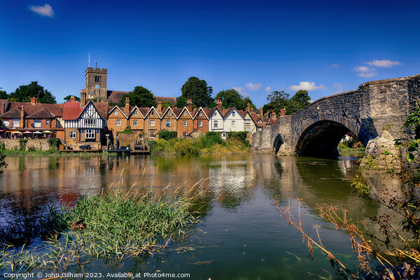 Aylesford Bridge over the river Medway with the Church and village in Kent England UK Framed Mounted Print by John Gilham
