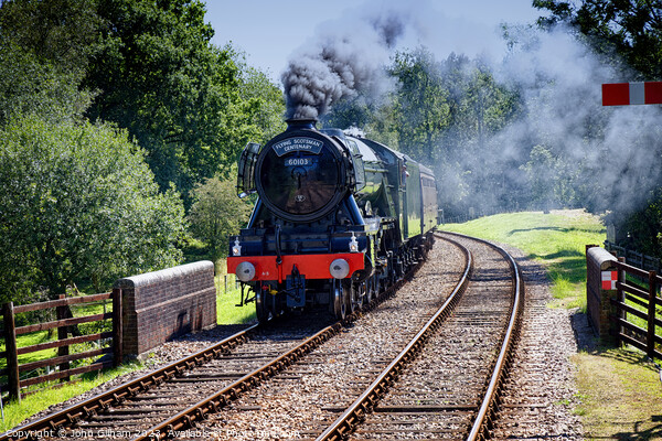 The Flying Scotsman 60103 Steam Locomotive under steam on its approach to Kingscote station West Sussex on a visit to The Bluebell Railway  Picture Board by John Gilham