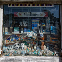 Buy canvas prints of Shop Window Corfu Town 2023 by John Gilham