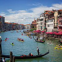 Buy canvas prints of Gondolas and boats in Venice Italy by John Gilham