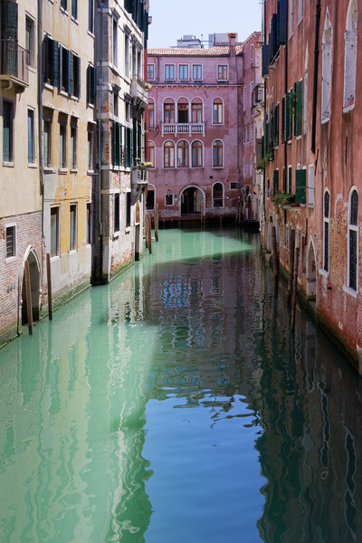 A narrow canal in Venice Italy Europe Picture Board by John Gilham