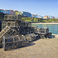 Buy canvas prints of Lobster Pots on Tenby Harbour in South Wales UK by John Gilham