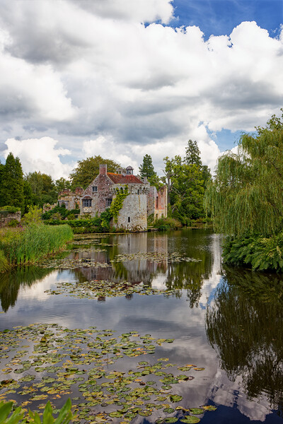 An English ruined Folly castle by the moat in Kent England UK Picture Board by John Gilham