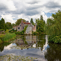 Buy canvas prints of An English ruined Folly castle by the moat in Kent England UK by John Gilham