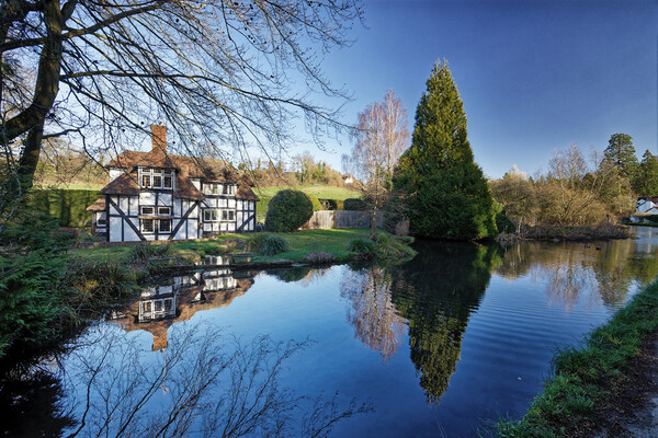 Reflections in the stream Loose Village in Kent UK Picture Board by John Gilham