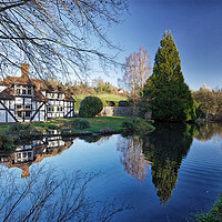 Buy canvas prints of Reflections in the stream Loose Village in Kent UK by John Gilham