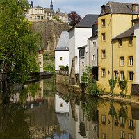 Buy canvas prints of Serene Reflections A Quaint European Capital by Dudley Wood