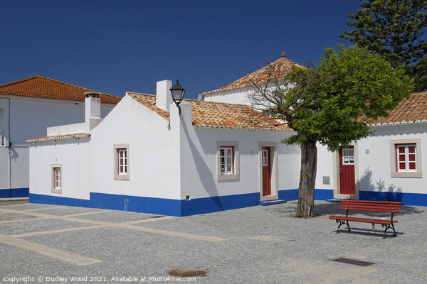 White Portuguese cottages with deep blue sky Picture Board by Dudley Wood
