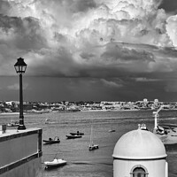 Buy canvas prints of Tempest Brews Over Cascais Bay by Dudley Wood