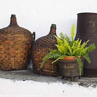 Buy canvas prints of Rustic Portuguese Wine Bottles by Dudley Wood