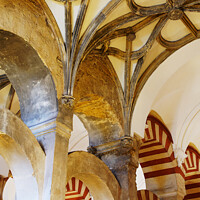 Buy canvas prints of Mezquita arches by Dudley Wood