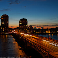 Buy canvas prints of Captivating Vauxhall Bridge Rush by Dudley Wood