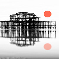 Buy canvas prints of Fiery Sunset at Brighton West Pier by Dudley Wood