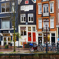 Buy canvas prints of Narrow houses Amsterdam 1 by Dudley Wood