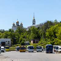 Buy canvas prints of Bus station and view of the Assumption Cathedral by Alexander Usenko