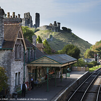 Buy canvas prints of Corffe Castle Station and  Castle Ruins by Benjamin Elliott