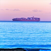 Buy canvas prints of Cargo Ship at Sunrise by Errol D'Souza