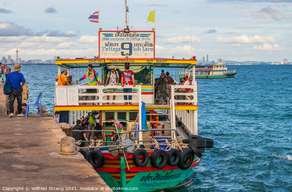 a ferry boat at the Pier of the Thai Island Koh Larn Thailand Asia Picture Board by Wilfried Strang