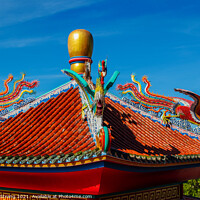Buy canvas prints of Chinese dragon statue on a roof of a temple by Wilfried Strang