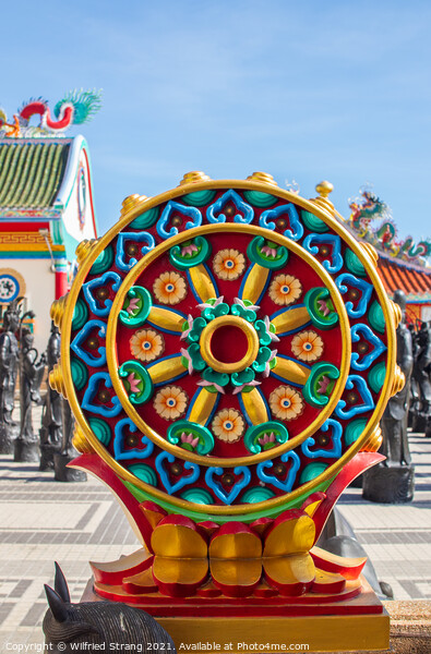 the Buddhist Dharma wheel known as that Wheel of teaching Picture Board by Wilfried Strang