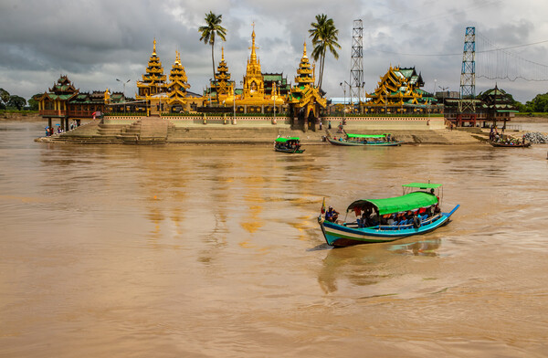 Cross the river by boat to the Midstream Kyauktan Pagoda or Ye Le Pagoda near Yangon in Myanmar Burma Picture Board by Wilfried Strang