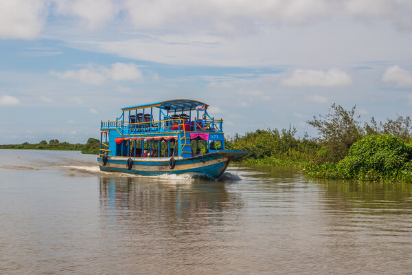 ferry boat at the Tonle Sap Lake in the Siem Reap Province Cambodia Picture Board by Wilfried Strang
